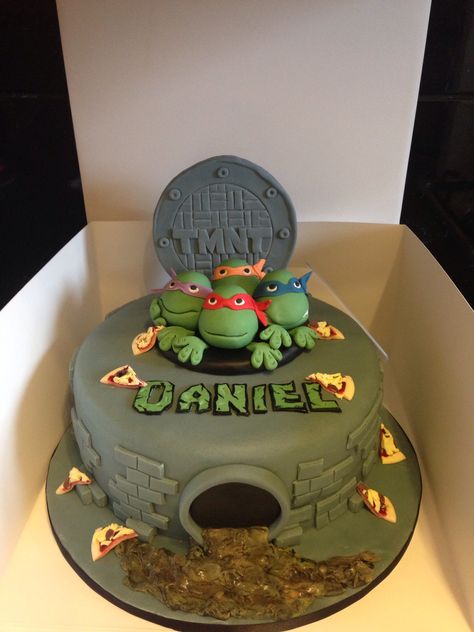 Teenage Mutant Ninja Turtles (TMNT) Cake - coul be cute with green ooz coming out of the sewer. I like the pizza slices too. Ninja Turtle Birthday Cake, Turtle Birthday Cake, Teenage Mutant Ninja Turtle Cake, Ninja Cake, Tmnt Cake, Turtle Birthday Parties, Tmnt Birthday, Ninja Turtles Birthday Party, Ninja Turtle Cake