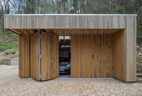 Upstairs, Downstairs: A Workshop and Garage Hidden in a Hillside - Gardenista Feilden Fowles, Garage Workshop Plans, Car Shed, Modern Garage Doors, Garage Studio, Carport Garage, Carport Designs, Garage Door Design, Wooden Garage