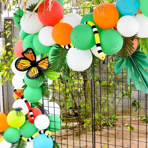 DIY Bug Balloon Garland | Fun365 Luau Decorations, Jungle Theme Parties, Forest Party, May Birthday, 50th Party, Orange Satin, Hawaiian Party, Leaf Decor, 3rd Birthday Parties