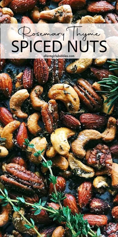 This Rosemary Thyme Spiced Nuts recipe is incredibly easy to make. The nuts are lightly spiced and beautifully fragrant with herbs, perfect for nibbling and gifting - a holiday favorite! Spiced Nuts Recipe, Homemade Peppermint Bark, Christmas Appetizers Easy, Small Appetizers, Ginger Molasses Cookies, Snack Mix Recipes, Holiday Eating, Nut Recipes, Roasted Nuts