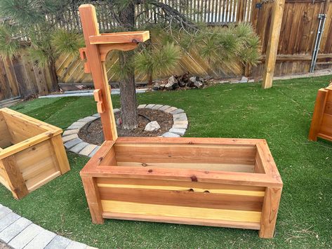 This redwood planter starts at the top with a bird feeder tray, attached to a plant stand that holds 4 potted plants. And finally the planter box. Made from dimensional lumber, no fence pickets here. We first seal the wood and add a urethane exterior finish. Another added feature is we line all our planter with a rubberized liner to insure lasting beauty. Redwood Planter Boxes, Fence Pickets, Wood Designs, Planter Box, Custom Woodworking, Bird Feeder, Pallet Projects, Wood Pieces, Planter Boxes