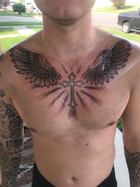 Cross With Wings Tattoo For Men Chest, Wing Chest Tattoo Men, Cross On Chest Tattoo Men, Chest Tattoo Men Ideas Wings, Wings Chest Tattoo Men, Chest Cross Tattoo For Men, Chest Peices Tattoos For Men, Under Chest Tattoo Men, Men Chest Tattoo Ideas Unique