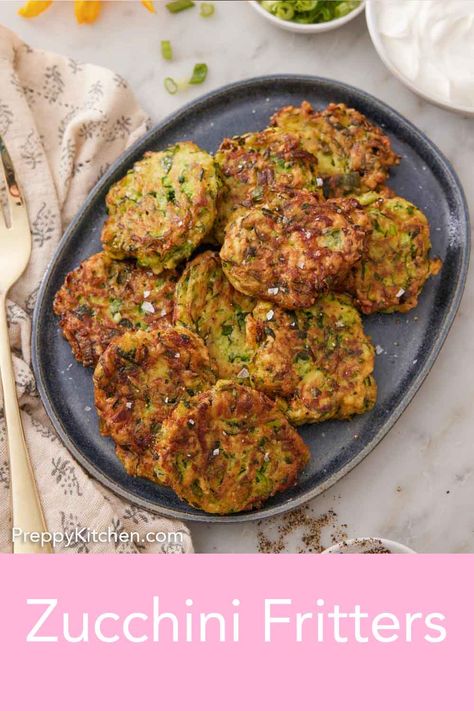 If you’ve been on the hunt for a recipe that's quick, delicious, and nutritious, look no further than my Zucchini Fritters recipe. With only 10 simple ingredients, a mere 30 minutes of your time, and a burst of vibrant flavors and essential nutrients, these summer squash fritters are the answer to your busy weekday dinner dilemmas. Summer Squash Fritters, Crispy Zucchini Fritters, Crispy Zucchini, Squash Fritters, Zucchini Patties, Zucchini Fritters Recipe, Easy Thanksgiving Recipes, Fritters Recipe, Preppy Kitchen