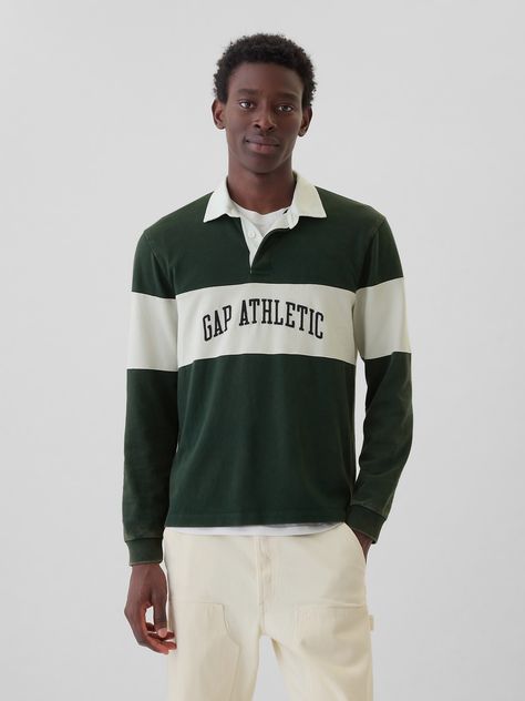 Soft cotton rugby polo shirt.  Polo collar, button placket.  Long sleeves with banded cuffs.  Pieced stripes.  Certain styles feature the Gap Athletic logo at front.  This product was made in a factory that runs the Gap Inc.  P. A. C. E.  Personal Advancement & Career Enhancement) program.  P. A. C. E.  is our educational program that helps the women who make our clothes build the skills, knowledge, confidence & resilience needed to advance in work & life.  Learn more here.  Straight silhouette Essex Green, Athletic Logo, High Top Adidas, Polo Design, Rugby Polo, Adidas Shop, Striped Polo Shirt, Swimwear Cover Ups, Swimwear Cover