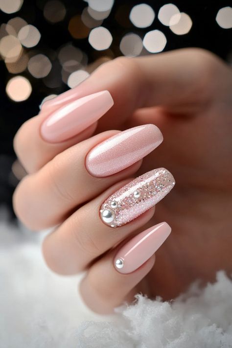 14 Creative Pink Christmas Nails for Every Style Light Pink Xmas Nails, Pastel Pink Nails With Glitter, Peach Christmas Nails, Pink Glitter And Chrome Nails, Cute January Nails Pink, Light Pink Nails With Stars, Light Pink And Gold Nail Designs, Pink Nails With Gold Design, Pink Golden Nails