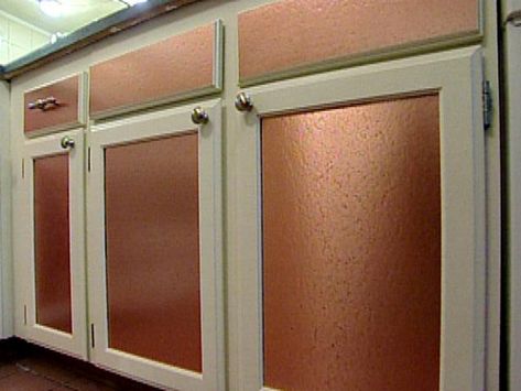 Learn how to update kitchen cabinet doors with beautiful copper panels. Kitchen Cabinet Door Ideas, Copper Kitchen Accents, Kitchen Cabinet Makeover, Hgtv Kitchens, Update Kitchen Cabinets, Kitchen Layouts, Copper Backsplash, Kitchen Cupboard Doors, Painted Cupboards