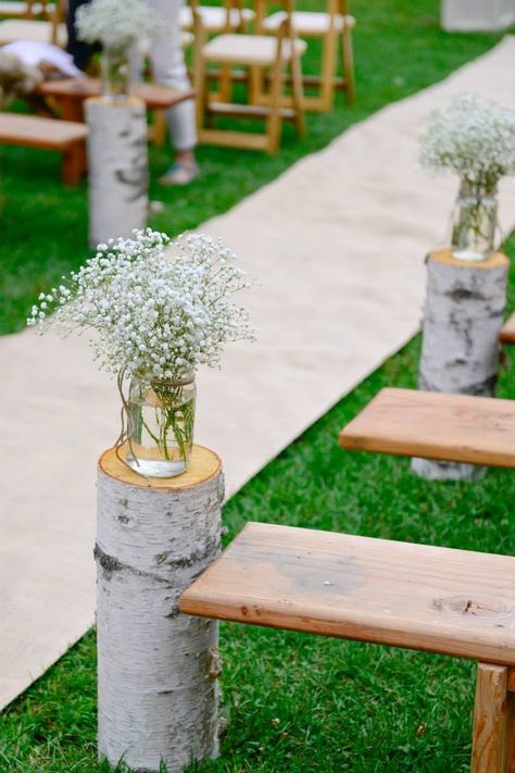 Camp Wedding Aisle - We have the White Birch, Beautiful Benches, & Green Grass all here! Natural Wedding Aisle Decor, Birch Branch Wedding Decor, Wedding Aisle Wood Stumps, Wedding Aisle Benches Decor, Simple Wedding Isles Decoration Outdoor, Birch Tree Wedding Decor, Wedding Bench Decor, Wedding Flower Containers, Birch Wedding Centerpieces