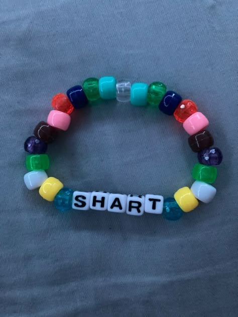 Crush Bracelet Ideas, Funny Pony Bead Bracelets, Candy Bracelet Ideas, Slay Bracelets, Bracelet Ideas Pony Beads, Matching Kandi Bracelets, Coquette Jewellery, Funny Bracelets, Scene Kandi