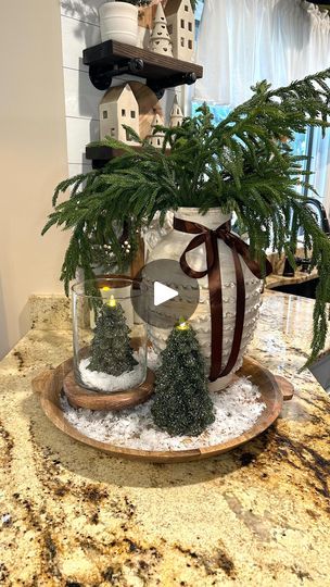 14K views · 436 reactions | ✨🌲CHRISTMAS CENTERPIECE… Comment LINKS to get the links sent directly to your inbox to shop this reel. Follow along as I style my favorite wood tray for Christmas featuring these beautiful, flameless Glitter Christmas Tree Holiday Candles from @luminaraworldwide #sponsored I absolutely love the concept behind these candles. The flickering flameless and elegant design make these candles a worry free/must have for all your holiday decorating needs. Not to mention, the convenience of a timer function and remote ready!  These hand poured evergreen trees come in multiple sizes and look absolutely stunning when grouped together. ✨✨✨✨✨✨✨✨✨✨ Link in bio to shop this reel on my @shop.ltk | https://liketk.it/4pGyx ✨✨✨✨✨✨✨✨✨✨ . . . . . #christmas #christmascenterpiece Christmas Greenery Arrangements, Christmas Decor Neutral, Luminara Flameless Candles, Candle Table Decorations, Christmas Centers, Artificial Snow, Greenery Arrangements, Neutral Christmas, Holiday Greenery