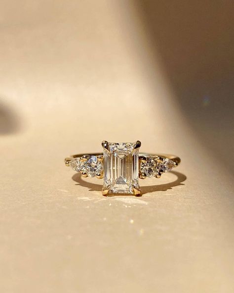 2 CT Emerald Cut Moissanite Solitaire Ring | Hidden Halo Engagement Ring | Dainty Wedding Ring | Unique Proposal Ring | Bridal Gifts/Ring ❤ ITEM DETAILS:- ✦ Brand: The American Gold House (TAGH) ✦ Handmade, high-quality item! ✦ Material: Solid 10K/14K/18K Gold, 950 Platinum and 925 Sterling Silver ✦ Diamond Type: Moissanite Diamond ✦ Diamond Cut: 6x8 MM Emerald ✦ Diamond Weight: 2.0 CT ✦ Main Stone Color: Colorless ✦ Width of Band: 1.8 MM (Bottom) ✦ Diamond Clarity: VVS/VS ❤ ACCENT/HALO DIAMONDS:- ✦ Side Stone Material: Moissanite Diamond ✦ Side Stone Shape: Round Cut ✦ Side Stone Carat Weight: 0.50 CT ✦ Side Stone Color: Colorless ✦ Diamond Clarity: VVS/VS ------------------------------------------------------------------------------ 💎 Moissanite VS Diamond 💎 --------------------------- Colored Moissanite, Solitaire Bands, Crunchy Granola, Ring Inspo, Cute Engagement Rings, Wedding Ring For Her, Future Engagement Rings, Emerald Cut Moissanite, Emerald Cut Rings