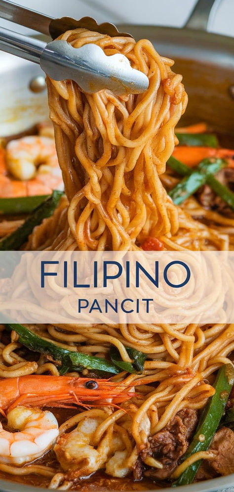 Filipino Pancit: a savory noodle dish packed with tender meat, shrimp, and vegetables, all stir-fried in a flavorful soy-based sauce. Perfect for celebrations and family gatherings! Pancit Recipe Filipino, Pancit Noodles, Filipino Noodles, Filipino Pancit, Noodles With Vegetables, Pancit Recipe, Shrimp And Vegetables, Tender Meat, Noodle Dish