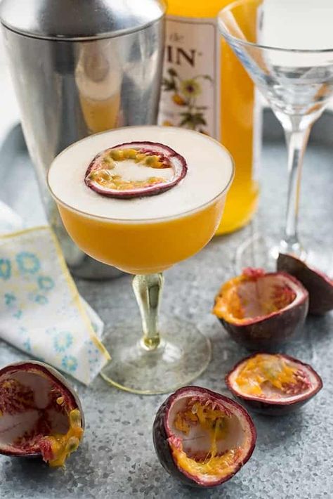 Passionfruit Martini - a refreshing and tangy cocktail for those who adore passion fruit! Recipes With Passion Fruit, Passionfruit Martini, Fruity Recipes, White Cocktails, Spiced Pear, Martini Recipes, Fruit Cocktails, Elegant Sophisticated, Easy Cocktails