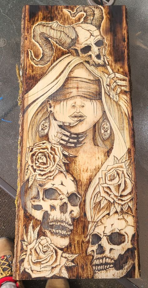 Woodburing on a 9.5x23x1 wood slab. A demon holding a woman and shhh -ing her from screaming. Roses and skulls. Halloween, spooky season art. Wood Burning Aesthetic, Burn Wood Art, Pyrography Art Woodburning, Wood Burning Art Ideas, Halloween Pyrography, Wood Burning Art Patterns, Pyrography Designs, Season Art, Predator Alien Art