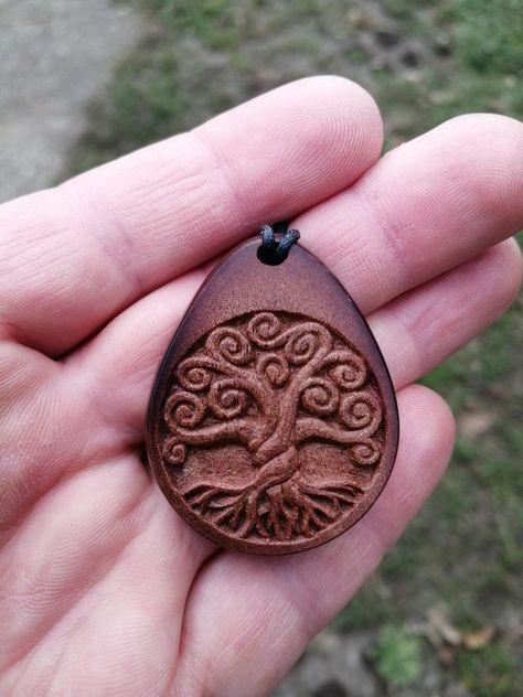 Hand Carved Avocado Seed Pendant Tree of Life Symbol Necklace | Etsy Avocado Art, Wooden Jewelery, Dremel Crafts, Tree Of Life Symbol, Dremel Carving, Wood Jewelery, Avocado Seed, Dremel Wood Carving, Chip Carving