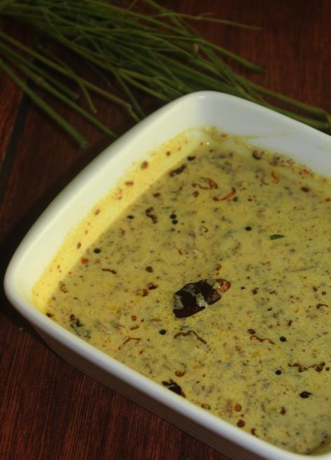 Traditional Kerala dish made using bitter guard,coconut and yogurt.This is one of the dishes of Kerala Sadya Kerala Meals, Raitha Recipes, Curd Recipes, South Indian Vegetarian Recipes, Veg Recipes Of India, Kerala Recipes, Indian Veg Recipes, Indian Rice Recipes, Kerala Food