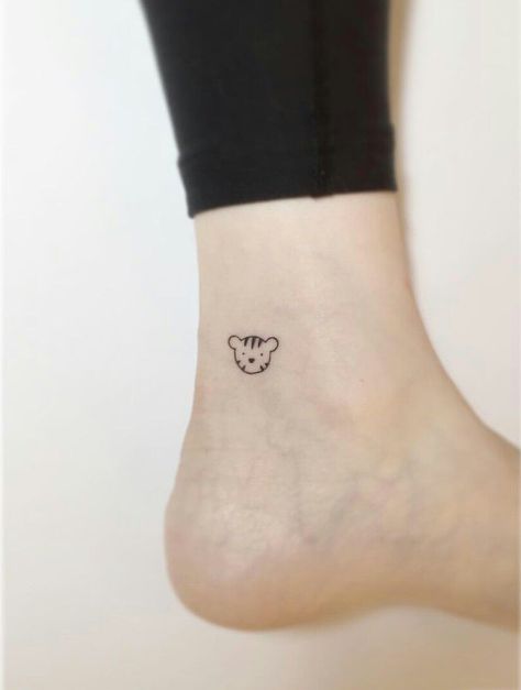 Cartoon Tattoos For Women Small, Tiny Tiger Tattoo Minimalist, Tiger Ankle Tattoo, Small Tiger Tattoo For Women Simple, Cute Cartoon Tattoos For Women, Cartoon Tiger Tattoo, Cartoon Lion Tattoo, Small Tiger Tattoo For Women, Minimal Tiger Tattoo