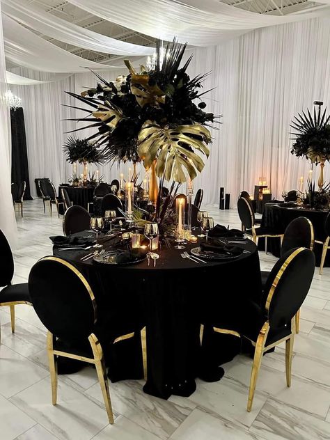 Black And Gold Banquet Ideas, Black Wedding Reception Ideas, Black And Gold Party Centerpieces For Men, Black Gold Silver Color Palette, A Night Of Elegance Party Ideas, Maskarade Black Party, Great Gatsby Table Decorations, Pastor Anniversary Decoration Ideas, Black And Gold Feather Centerpieces