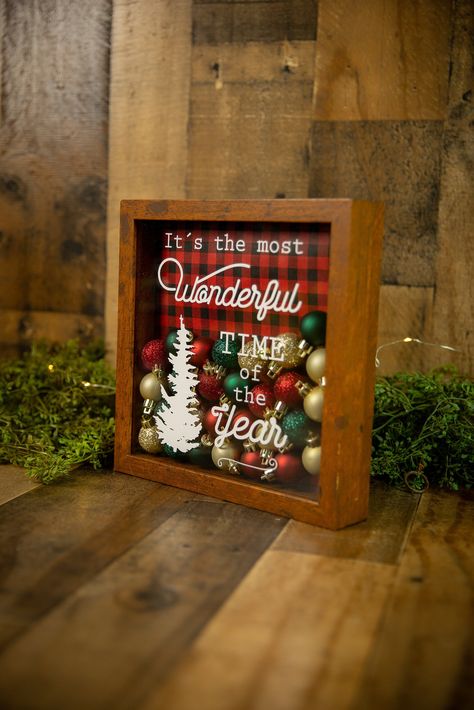 "Let it snow ~ This beautiful Christmas shadow box will be a great addition to your holiday home décor. Perfect for a fireplace mantle, wall or other surface in your home. This white shadow box is filled with mini ornaments and and a snowy background . Front of the glass says \"let it snow\" Give a personalized gift that will last a lifetime! This is perfect for baby showers, gender reveals, home decor, birthday, anniversaries, holidays or special occasions. If the Rush Order Fee is not applied on check-out, we will be shipping the order out as per our delivery policy ORDER PICK-UPS:  Please message us for a coupon to waive shipping. We are located in Deerfield Beach, Florida." Shadow Box Christmas, Diy Christmas Crafts To Sell, Cadre Diy, Decor Christmas Home, Christmas Shadow Boxes, Diy Shadow Box, Christmas Crafts To Sell, Mini Ornaments, Christmas Decorations For The Home