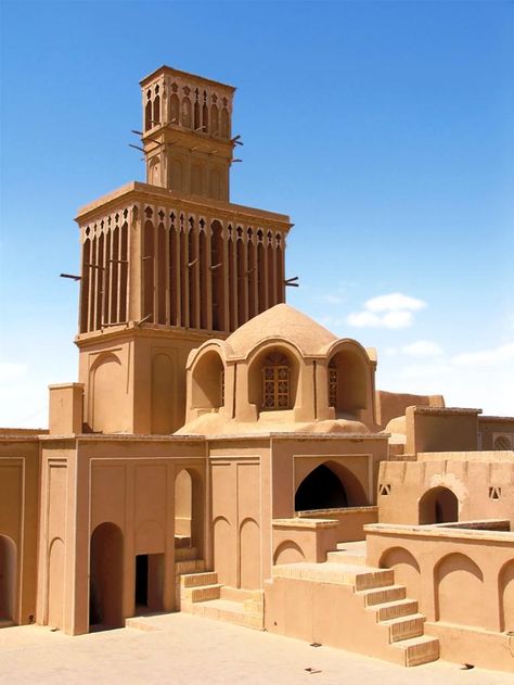 Airducts on the roofs of houses in Yazd give a unique appearance to the city. Airducts (or badgir ) are masterpieces of Persian architecture and design.   Yazd, the largest brick town in the world, with an old but lively fabric, is called the City of Airducts. It’s a nice experience to walk on its roofed alleys in the heart of summer! Iran Desert, Clay City, Navi A Vela, Iran Pictures, Iranian Architecture, Persian Architecture, Iran Travel, Desert Design, Persian Culture