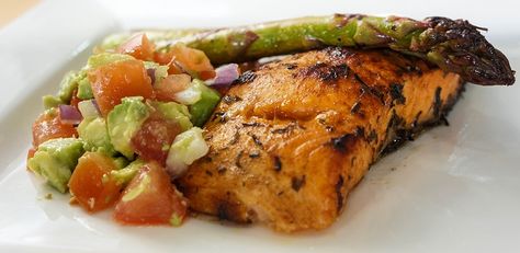 This melt-in-your-mouth salmon recipe goes great with a side of salsa and asparagus. Seafood Marinades, Paleo Salmon Recipe, Work Treats, Salmon With Avocado, Paleo Salmon, Salmon With Avocado Salsa, Thanksgiving Brunch, Blackened Salmon, Easter Menu