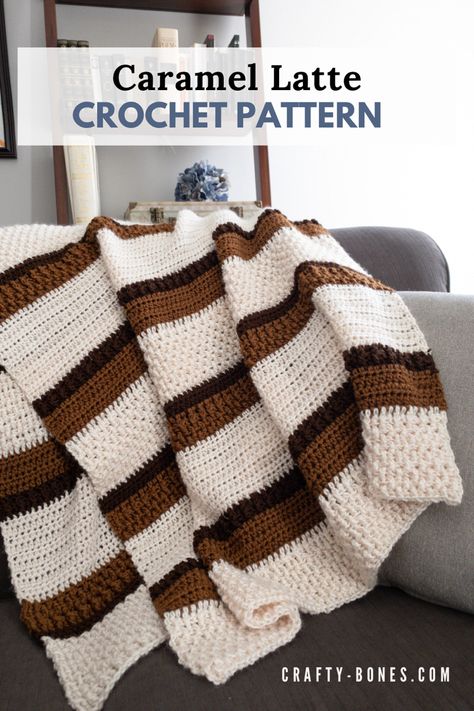 Off white, caramel, and brown striped blanket with a pattern variation being displayed over the back of a couch Heart Crochet Blanket, Crochet Blanket Patterns Free, Crochet Baby Blanket Tutorial, Stitch Techniques, Crochet Throw Pattern, Heart Crochet, Crochet Afghan Patterns Free, Modern Crochet Patterns, Easy Crochet Blanket