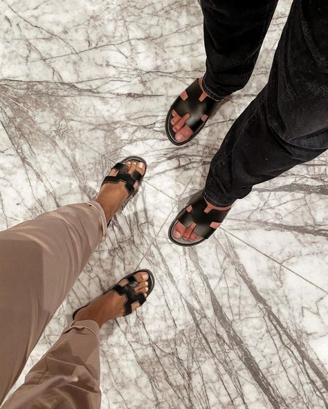 TATIANA ♥ PRITCHARD on Instagram: “His and hers🖤 . . #hisandhers #couple #couplegoals #fashion #style #hermes #oran #sandals #styleinspo #styleblogger #styleinspiration…” Styling Hermes Oran Sandals, Hermes Egerie Sandal Outfit, Hermes Oasis Sandals Outfit, His And Hers Shoes, Hermes Sandals Outfit, Hermes Oran Sandals Outfit, Hermes Slippers, Hermes Sandals, Hermes Oran Sandals