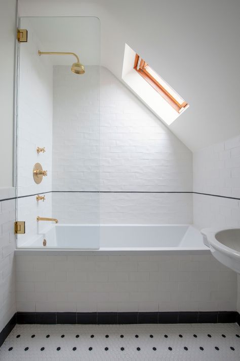 A play on the minimalist blackandwhite aesthetic featured in the master bath the childrens bathroom is light and bright... Sloped Ceiling Bathroom, Attic Bathroom Ideas, Small Attic Bathroom, House Of Hackney Wallpaper, Loft Bathroom, Airy Room, Attic Bathroom, Ireland Homes, Upstairs Bathrooms