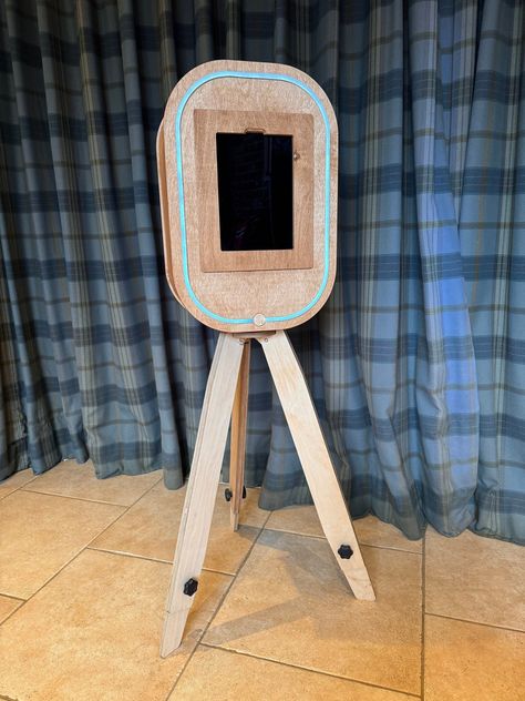 The must have Photo Booth for Wedding, Events, Photo Booth, DJ's And Wedding Venues, The Party Pod is Quick and easy to set up and typically takes just 5 Minutes from arrival to the first picture! The ipad Party Pod has been hand crafted using FSC Certified Birch plywood for the main pod and height adjustable tripod with stainless steel fasteners and an included battery bank for photo lighting, All finished in a water resistant hard wax oil for when the weather takes a turn!  Features: -Height adjustable Tripod  -Led photo lighting strip -Included Battery bank for portability , lighting and ipad charging for all day events! ( low voltage supply for no pat testing ) -Hand Crafted at our Suffolk workshop  ( Buy straight from the supplier with no markup! ) -Available in Light , Dark & Brillia Photo Booth For Wedding, Photo Booth Stand, Photo Booth Machine, Portable Photo Booth, Ipad Photo Booth, Event Photo Booth, Battery Bank, Diy Photo Booth, Event Company