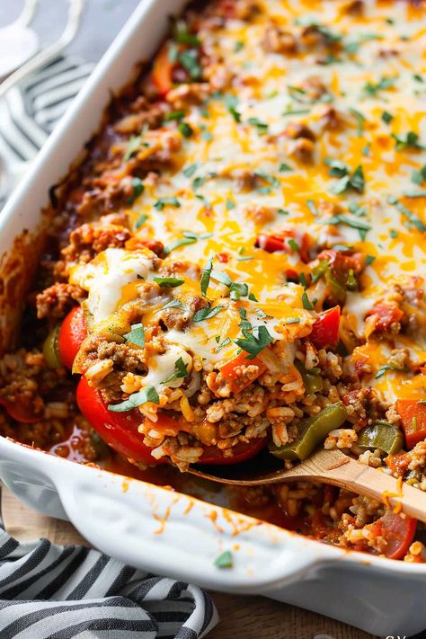 Whip up this Easy Stuffed Bell Pepper Casserole for a family-friendly dinner that combines savory ground beef, colorful bell peppers, and melty cheese in a delicious one-dish meal. Perfect for busy weeknights, it's a tasty way to get your veggies and protein. Ready in just an hour, it's sure to become a new favorite. Pin this recipe now for an easy and satisfying dinner solution! Healthy Recipes With Bell Peppers, Bell Pepper Casserole Ground Beef, Stuffed Bell Peppers Casserole, Green Bell Pepper Recipes, Stuffed Bell Pepper Casserole, Green Pepper Casserole, Stuff Pepper, Unstuffed Pepper Casserole, Easy Stuffed Bell Peppers