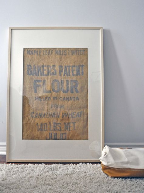 Framed old burlap flour sack. Framed Coffee Sack, Burlap Sack Decor, Burlap Wall Decor, Burlap Wall Art, Burlap Coffee Bags, Framed Burlap, Inexpensive Art, Coffee Sacks, Coffee Bags