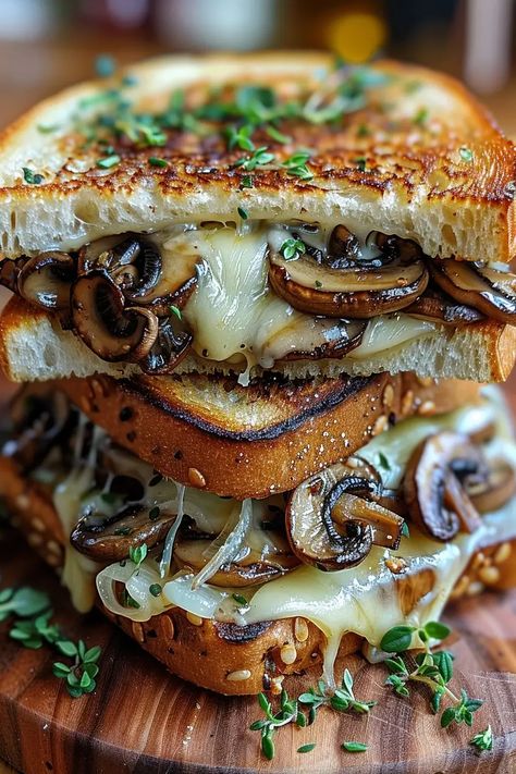 Explore our Grilled Cheese with Gouda, Roasted Mushrooms, and Onions recipe to create a perfect blend of gooey cheese and savory vegetables. Roasted Mushrooms And Onions, Mushroom Grilled Cheese, Mushroom Grilled, Mushroom Sandwich, Mushrooms And Onions, Gourmet Grilled Cheese, Grilled Cheese Sandwiches, Grilled Cheese Recipes, Garlic Mushrooms