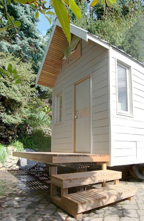 little home built by two architecture graduates, Lauren Aarntzen and John McFarlane. Tiny House Australia, Micro Living, Cottage Tiny House, Eco Homes, Tiny House Exterior, Tiny House Trailer, Tiny Cabins, West Vancouver, Tiny House Movement