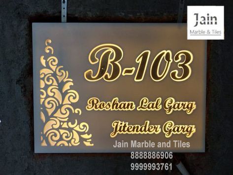 Contemporary Nameplate solutions from Jain Marble and Tiles, Delhi. This nameplate gleams with golden in the daytime and assent light works its magic in the evening. The base is solid surface pearl white. Searching for a stylish nametag, ping us!! 8888886906 9999993761 9711871646 White Name Plates For Home, Marble Name Plates For Home, Indian Name Plates For Home Doors, Name Plates For Home With Light, Light Name Plate, Name Plate For Home Modern, Wooden Name Plates, Cnc Furniture Plans, Door Name Plates