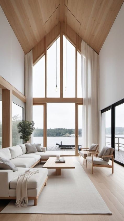 Stunning Scandinavian Living Room with Lakeside Views White Oak Vaulted Ceiling, Living Room Skylight Ideas, Scandinavian House Design Interiors, Vaulted Ceiling Curtains, Nordic Interior Design Scandinavian Living, Natural Light Interior Design, Barndo Windows, Scandinavian Sunroom, Scandinavian Living Room Nordic Style