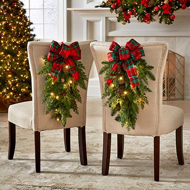 Christmas Wearth, Chair Swag, Christmas Banister, Christmas Chair Covers, Christmas Chair, Christmas Dining Room, Hammacher Schlemmer, Xmas Deco, Festive Holiday Decor