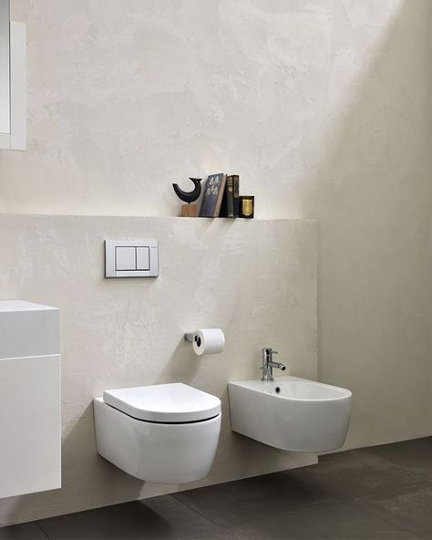 My dream home will have an energy-efficient, dual-flush, wall-hung toilet with matching bidet with built-in dryer, connected to on-demand tankless water heater! But for the small bathroom, a bidet seat attachment on the toilet will do. Wall Mount Toilet Ideas, Wall Mounted Toilet Ideas, Bathroom With Bidet, Toilet And Bidet, Corner Shower Stalls, Bathroom Bidet, Minimalistic Bathroom, Minimalist Interior Decor, Toilet Bidet