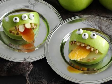 Get Healthy Monster Apples Recipe from Food Network Monster Apples, Salty Party Snacks, Delicious Halloween Desserts, Halloween Food Snacks, Monster Shapes, Halloween Foods, Easy Halloween Party, Halloween Dessert, Halloween Food Treats