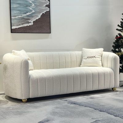 83.46 "Cream Boucle fabric sofa, Chesterfield velvet upholstered Mid-century modern 3 seats sofa, metal round sofa foot design with two comfortable teddy throw pillows Fabric: White Velvet | Latitude Run® Johm 83.46" Velvet Round Arm Sofa Cotton in White, Size 28.9 H x 83.46 W x 35.04 D in | Wayfair Sofa Metal, Sofa Chesterfield, Modern Velvet Sofa, Metal Sofa, Foot Design, Dining Room Blue, Latest Living Room Designs, Velvet Cloth, Sofa Cotton