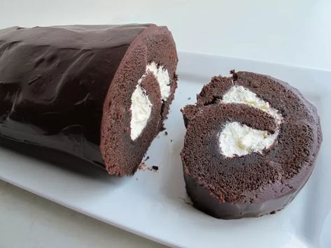 Chocolate Roll (a.k.a. Giant Yodel) Recipe Mugcake Recipe, Chocolate Snack Cake, Ganache Icing, Log Cake, Chocolate Roll, Vanilla Whipped Cream, Spiced Coffee, Caking It Up, Roll Cake