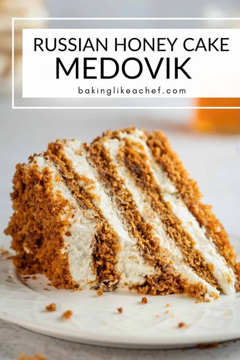 Honey cake Medovik, also known as Medovik tort, is a classic Russian layer cake featuring honey-infused biscuit layers sandwiched with a delicious sour cream frosting. This sweet and rich cake is ideal for birthdays, entertaining gatherings, or even picnics. The recipe is easy and quick, with the added convenience of a freezing option. | bakinglikeachef.com Medovik Honey Cake, Medovik Cake Recipes, Russian Cake Recipes, Tort Recipes, Russian Honey Cake Recipe, Cream Cheese Layer Cake, Medovik Recipe, Honey Cake Recipe Easy, Medovik Cake