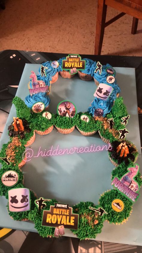 #fortnitebattleroyale #fortnite #fortnitebirthday #fortnitecake #pullapartcake #cupcakecakes #8thbirthday Fortnite Pull Apart Cupcake Cake, Fortnite Birthday Cupcake Ideas, Fortnite Cupcake Cake, Fortnite Birthday Cupcakes, Fortnite Cupcakes For Boys, Fortnight Cupcakes, Fortnite Cupcakes Ideas, Fortnite Cupcakes, Game Truck Birthday Party