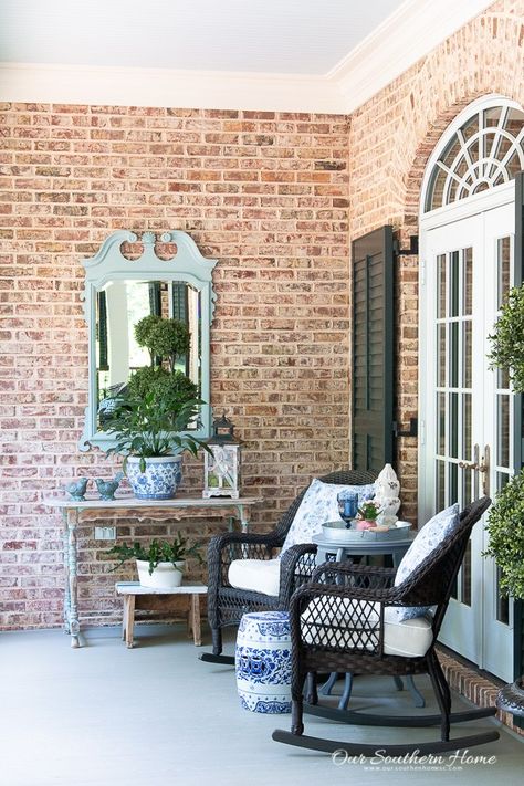 Create a welcoming entrance with these tips on creating a summer front porch with shades of blue! #frontporch #porchdecor #porchdecorating #bluefrontporch #gardenstool #chinoiserie #outdoorrug #outdoortopiary Outdoor Topiary, Stool Makeover, White Porch, Large Backyard Landscaping, Backyard Garden Layout, Summer Decorations, Summer Front Porches, Outdoor Tablecloth, Garden Wallpaper