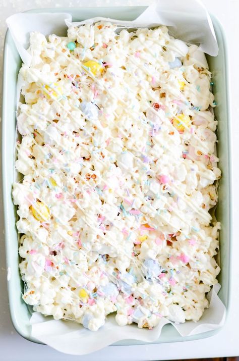 Easter Bunny Popcorn Bars | It’s basically Rice Krispie Treats. But I’m using kettle corn instead of cereal. Oh, and I’m tossing a whole bunch of mini Cadbury eggs in there too. Because… mini Cadbury eggs. Duh. Easter Recipes For A Crowd, Easter Desserts For A Crowd, Best Easter Recipes, Crowd Images, Easter Popcorn, Easter Deserts, Recipes For A Crowd, Cadbury Eggs, Easter Snacks