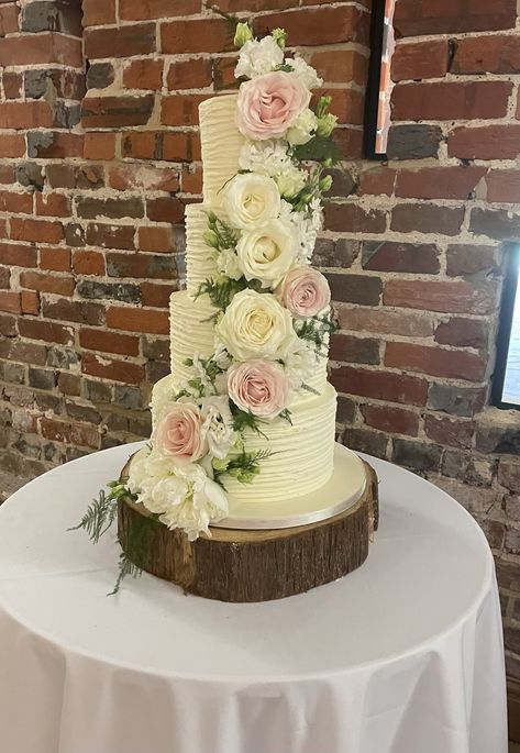 4 tier textured buttercream frosted wedding cake in the Nature's Charm design with cascade of fresh roses, freesias, lisianthus, peonies and asparagus fern Frosted Wedding Cake, Textured Buttercream, Asparagus Fern, Engagement Cakes, Sugar Flowers, Buttercream Frosting, Bridal Style, Fern, Asparagus