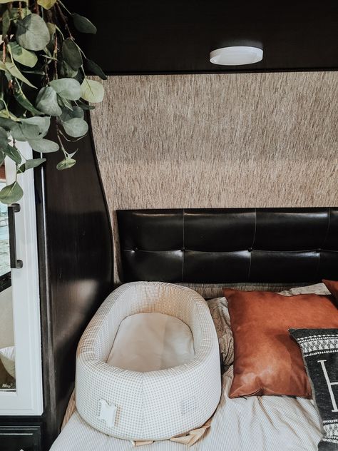 My 10 Newborn Must-Haves for RV Living!! — Cool, Mom, and Collected Travel Trailer Nursery Ideas, Rv Living Must Haves, Travel Trailer Nursery, Rv Crib Ideas, Nursery Ideas In A Camper, Nursery In Camper, Newborn Rv Living, Rv Living Room Remodel, Pop Up Camper Must Haves