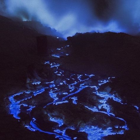 blue lava at kawah ijen volcano, indonesia. the phenomenon occurs when sulfur burns. the reaction produces an electric-blue flame that has the illusory appearance of lava 🌋 Ijen Volcano, Kawah Ijen, Blue Lava, Female Dragon, Magnum Opus, Fantasy Story, Blue Flames, Land Art, Volcano