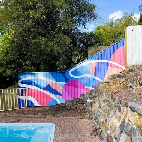 I painted this colourful abstract mural for my client in Warner’s Bay last week. It’s been raining like crazy but I managed to paint it during patches of sunshine! If you can’t tell I’m currently obsessed with this colour palette and I love the contrast of the hues against the green trees. What’s your favourite colour to paint with at the moment? #paint #art #mural #newcastle #lakemacquarie Colorbond Fence, Abstract Mural, Fence Art, Colourful Abstract, Favourite Colour, Paint Art, Like Crazy, Green Trees, Newcastle