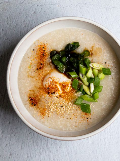 Okayu, Japan’s sibling to congee, is regarded as the ultimate comfort food. In its simplest form it’s just rice and water, but quality stock or dashi and condiments are key to the success of this very soothing breakfast bowl. Okayu Recipe, Rice For Breakfast, Rice Porridge, Leftover Rice, Poached Egg, Breakfast Bowl, Food Inspo, Ultimate Comfort Food, Spring Onion