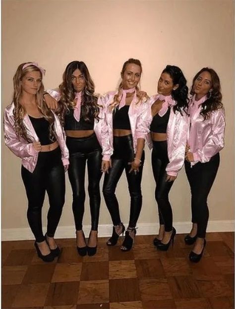 Pink Ladies from Grease | The best group Halloween costumes for teens girls and cute group Halloween costumes college. If you’re looking for friend group Halloween costumes for work, costumes for 3, costumes for 4, or even costumes for family, you’re in the right place! Find easy girl group Halloween DIY costumes for adults and for teens. There’s large group Halloween costumes, big and small group unique Halloween costumes and so much more! #halloweencostumes #grouphalloweencostumes #cutegrouph The Pink Ladies Costume, Pink Lady Halloween Costume, Pink Ladies Grease Costume, Pink Ladies Halloween Costume, Pink Ladies Halloween Costumes, Pink Ladies Halloween, Pink Ladies Costume, Halloween Costume Group, Pink Lady Costume