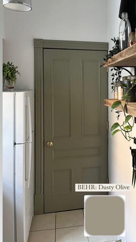 French country small white kitchen with green door and door frame Washed Olive Behr, Olive Green Door Interiors, Green Painted Walls Behr, Olive Green Behr Paint, Olive Doors Interior, Olive Front Door Colors, Perfect Olive Green Paint, Olive Color Paint, Behr Witch Hazel